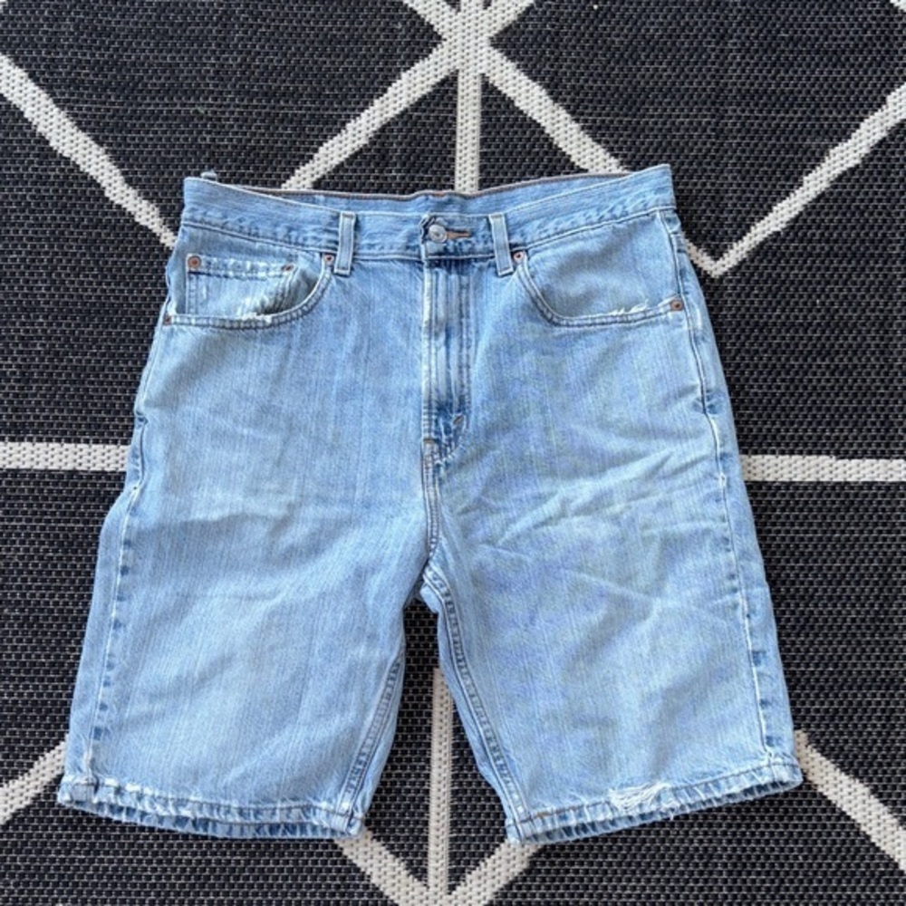 Vintage distressed Jorts - Levis size 34
Men's Light Blue Denim jorts